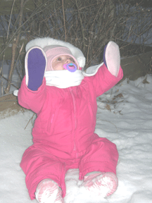 LITTLE GIRL WEARING SMITTENS 